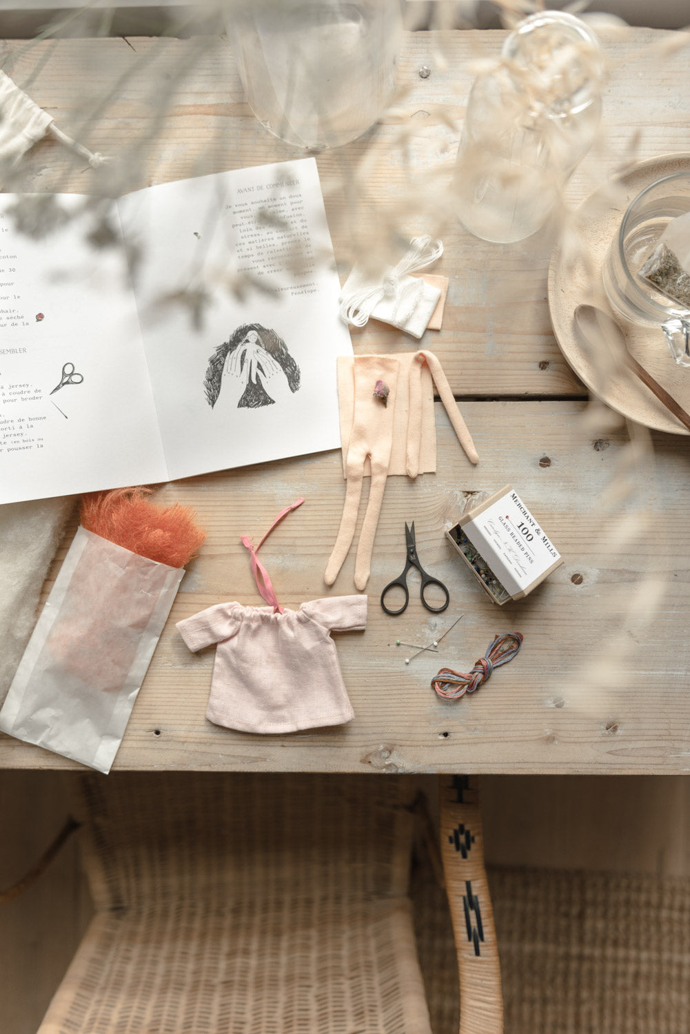 Wrapped Ma jolie mini doll kit on a wooden craft table